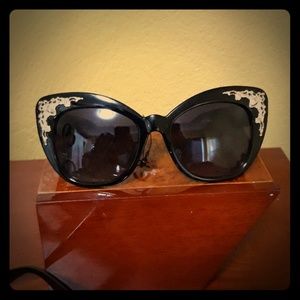 Black gold trim sunglasses